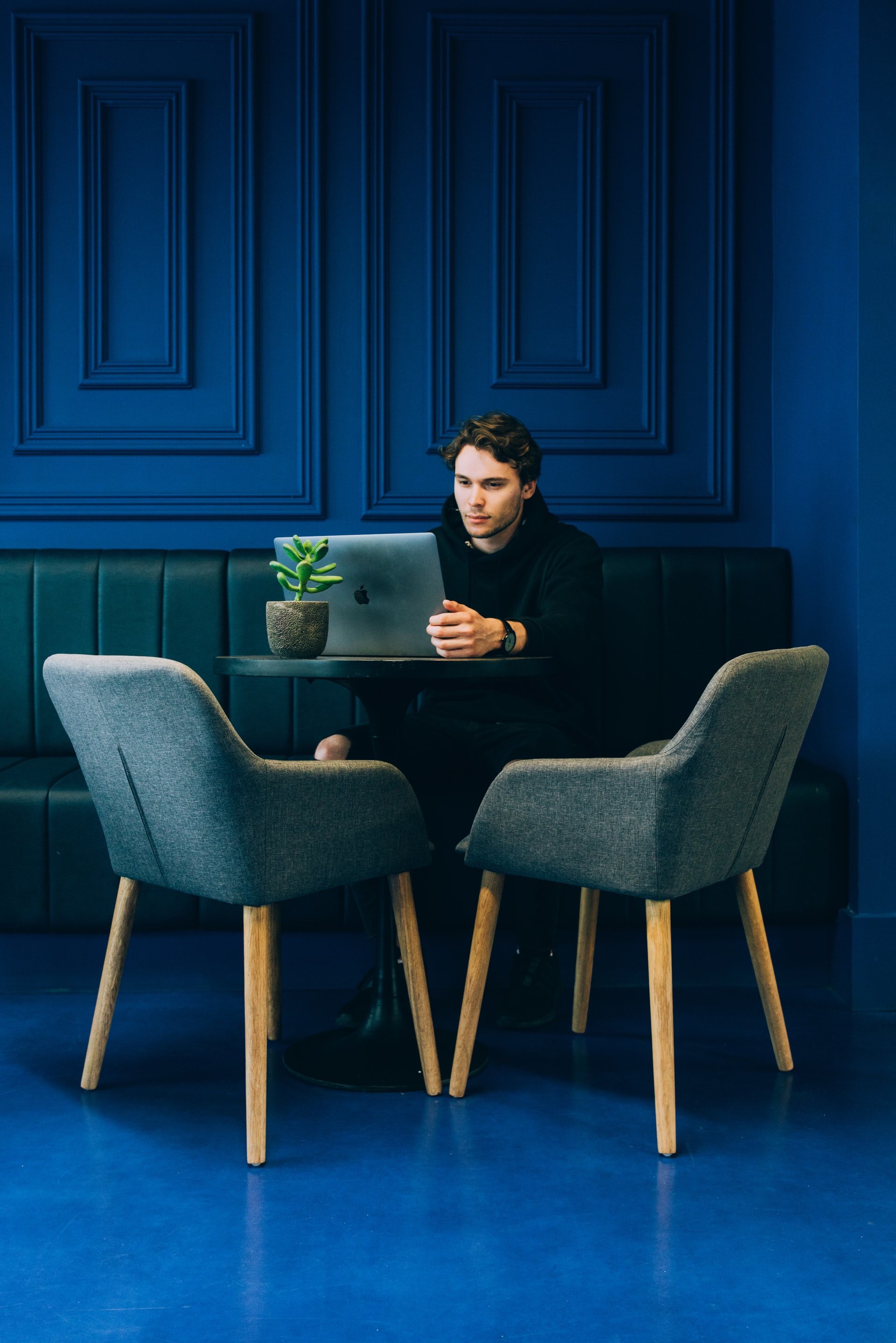 A person sitting down reading